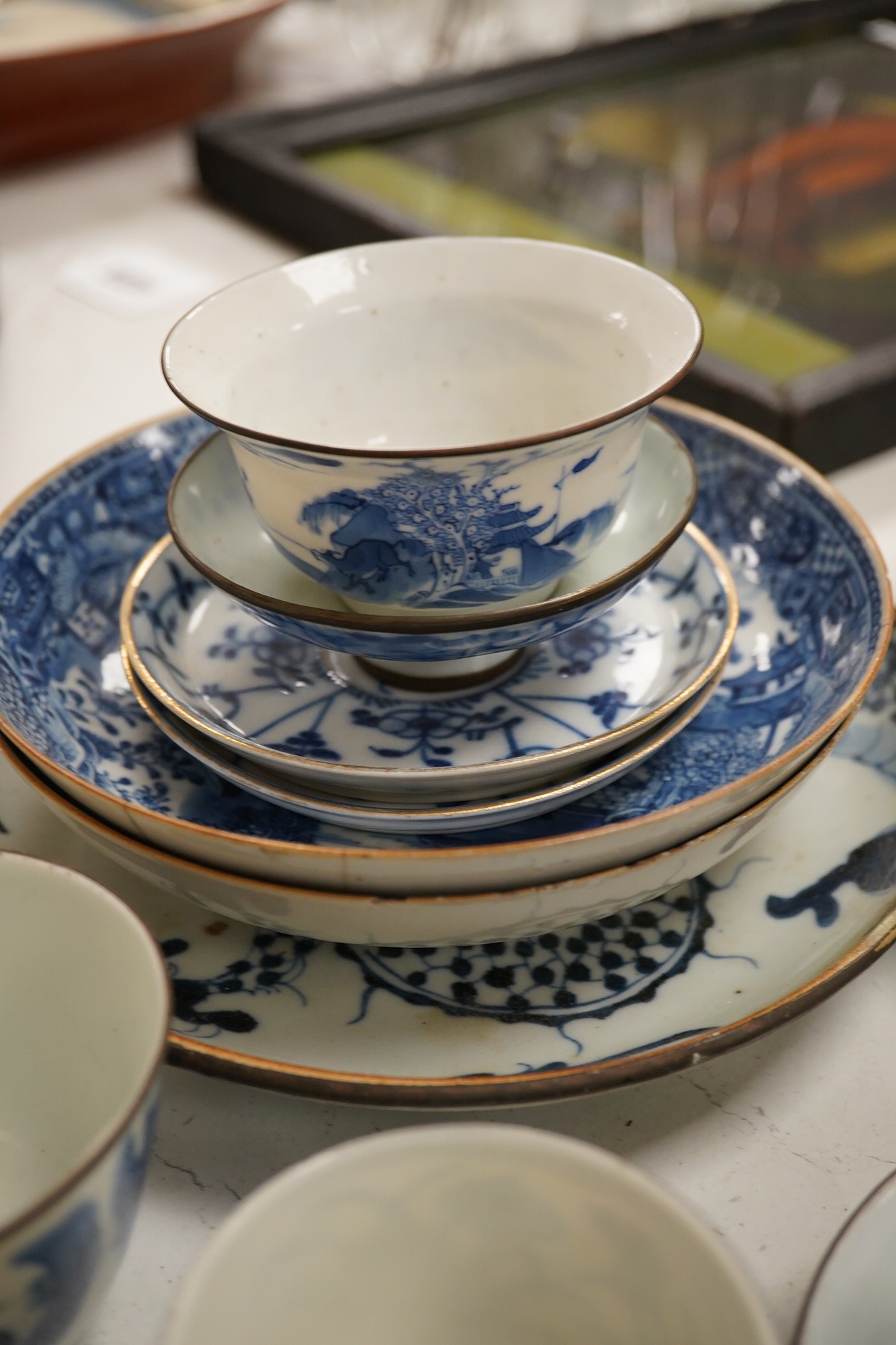 A group of assorted Chinese blue and white tableware. Largest 25cm. Condition - poor to fair